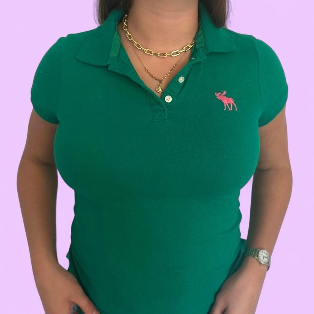 Green Polo Shirt with Pink Logo